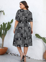 Plus Black Graphic Print Crisscross Puff Sleeve Wrap Midi Dress